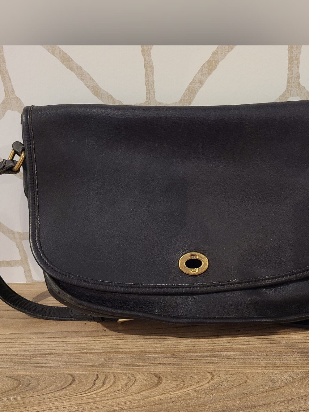 Classic Black Leather Shoulder Bag with Gold Turnlock